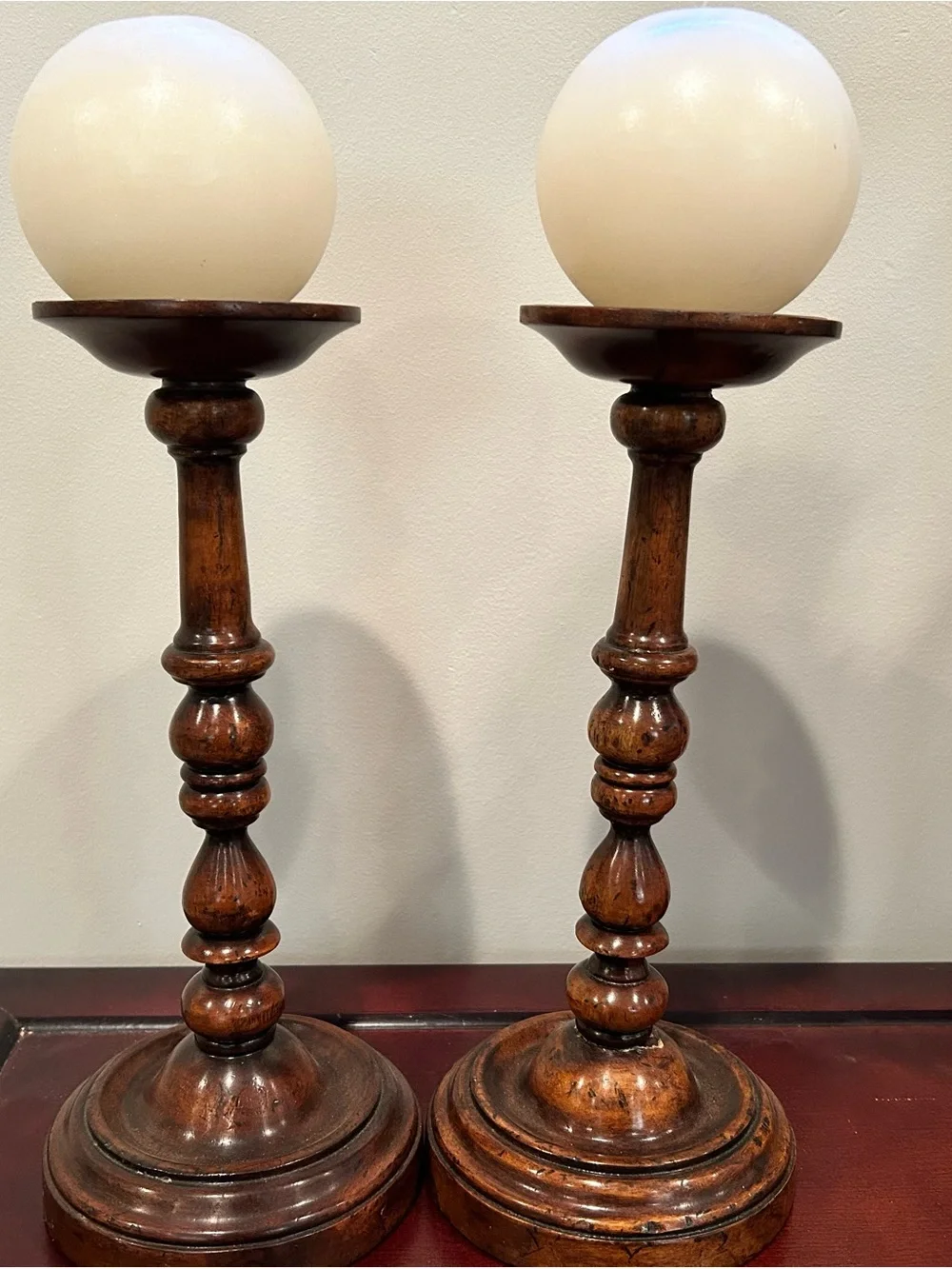 Pair of Turned Wood Candle Holders with Cream Pillar Candles
